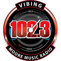 Vibing 102.3 MMR radio logo
