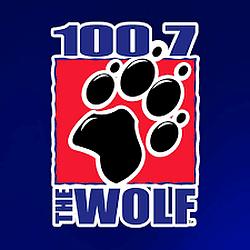 100.7 The Wolf radio logo