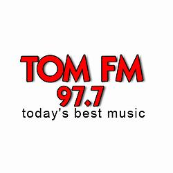 97.7 Tom FM logo