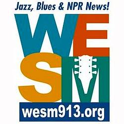 WESM 91.3 FM logo